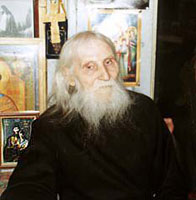 Старец Николай Гурьянов. Радом со Страцем хорошо видна его чудотворная келейная икона Святого Новомученика Григория Нового (Распутина)